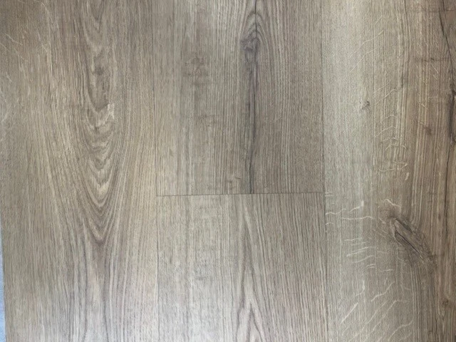 Close up of an standard wood sample of laminate flooring.