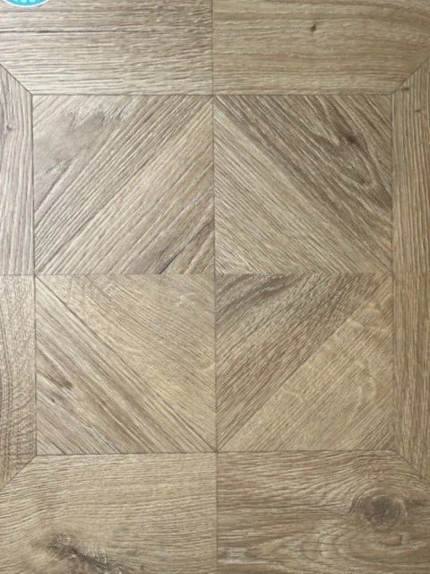 Close up of a geometric sample of laminate flooring.